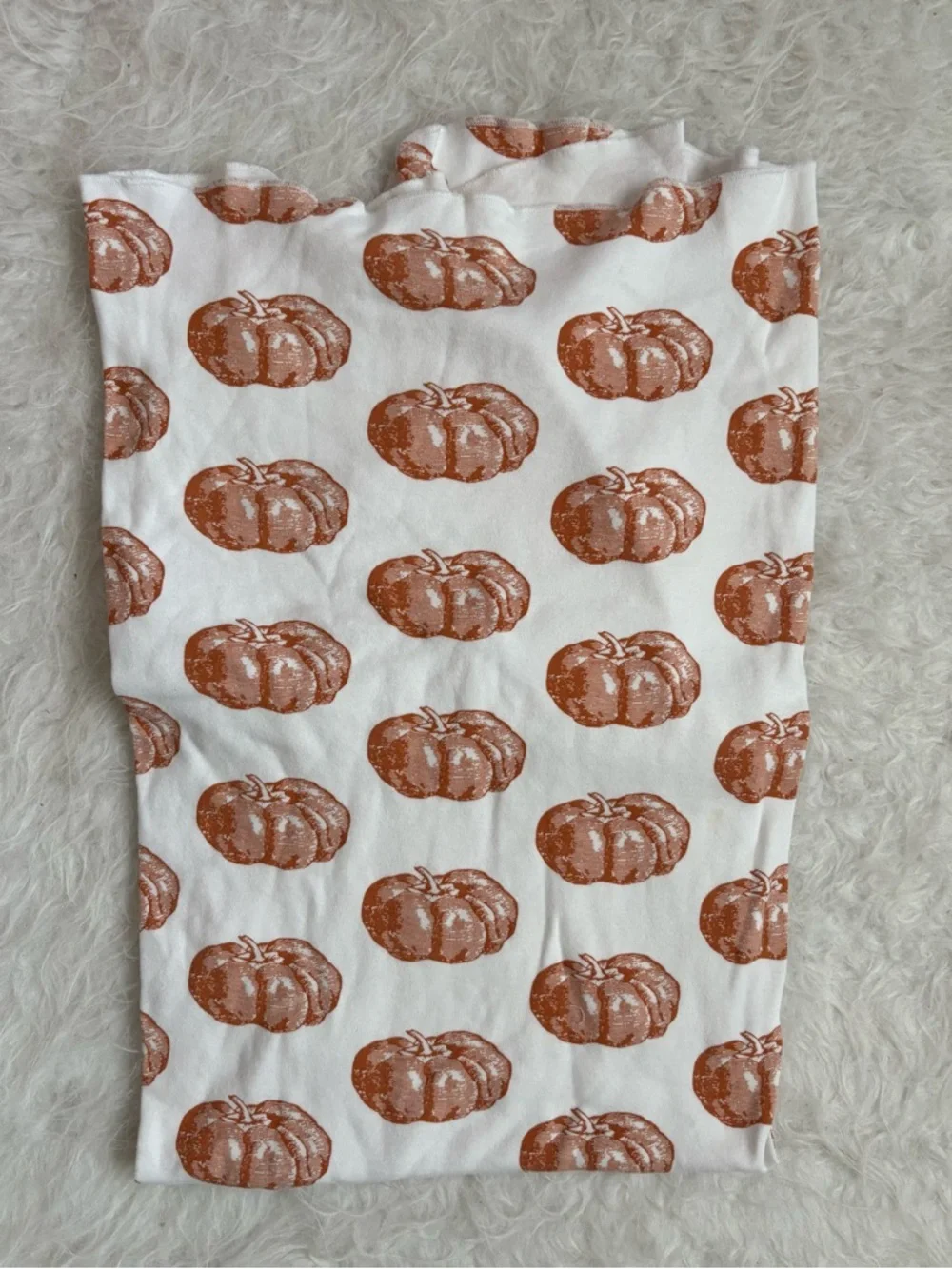 kate quinn White Baby Swaddle Blanket with Terra Cotta Pumpkin Print